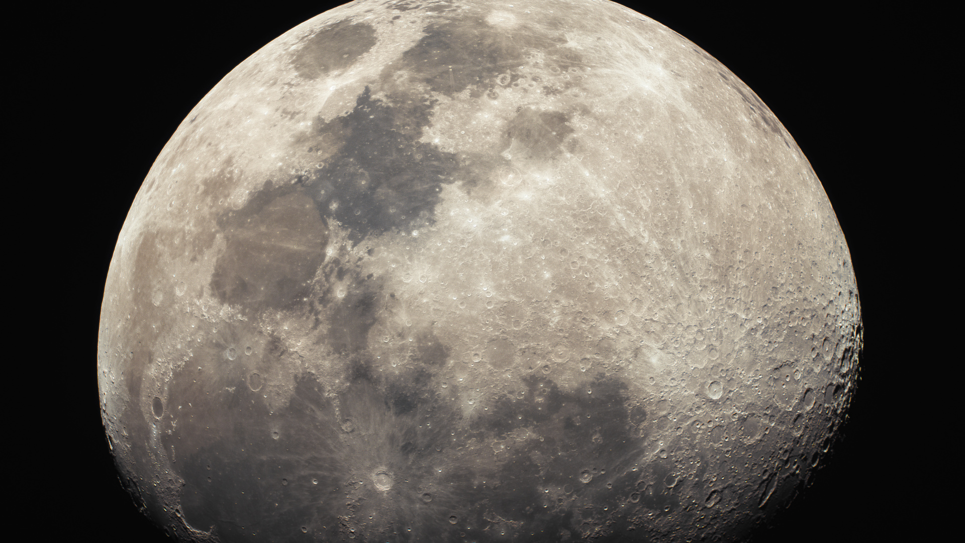 A detailed full moon image captured with the SVBONY MK105 Pro Maksutov-Cassegrain telescope.